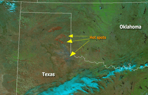 Satellite image depicting fire locations or burn scars in Texas on March 13, 2006
